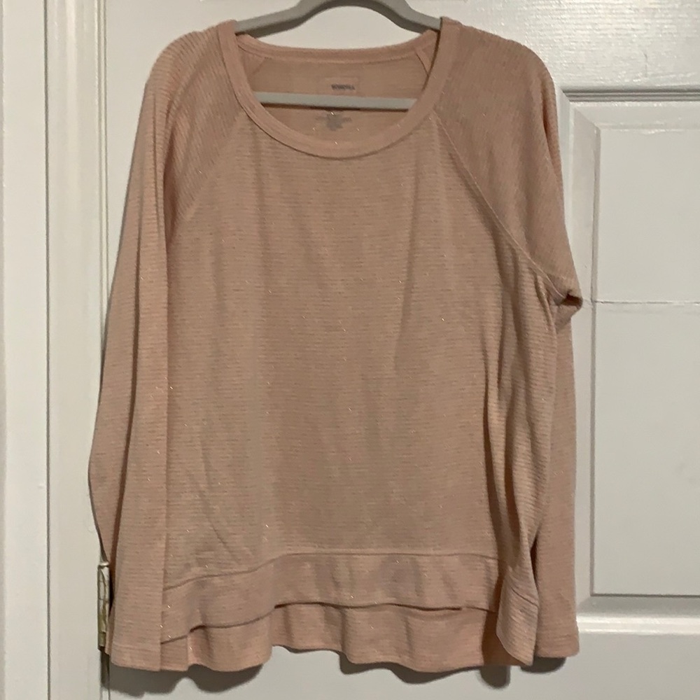 Woman’s long sleeve t shirt.